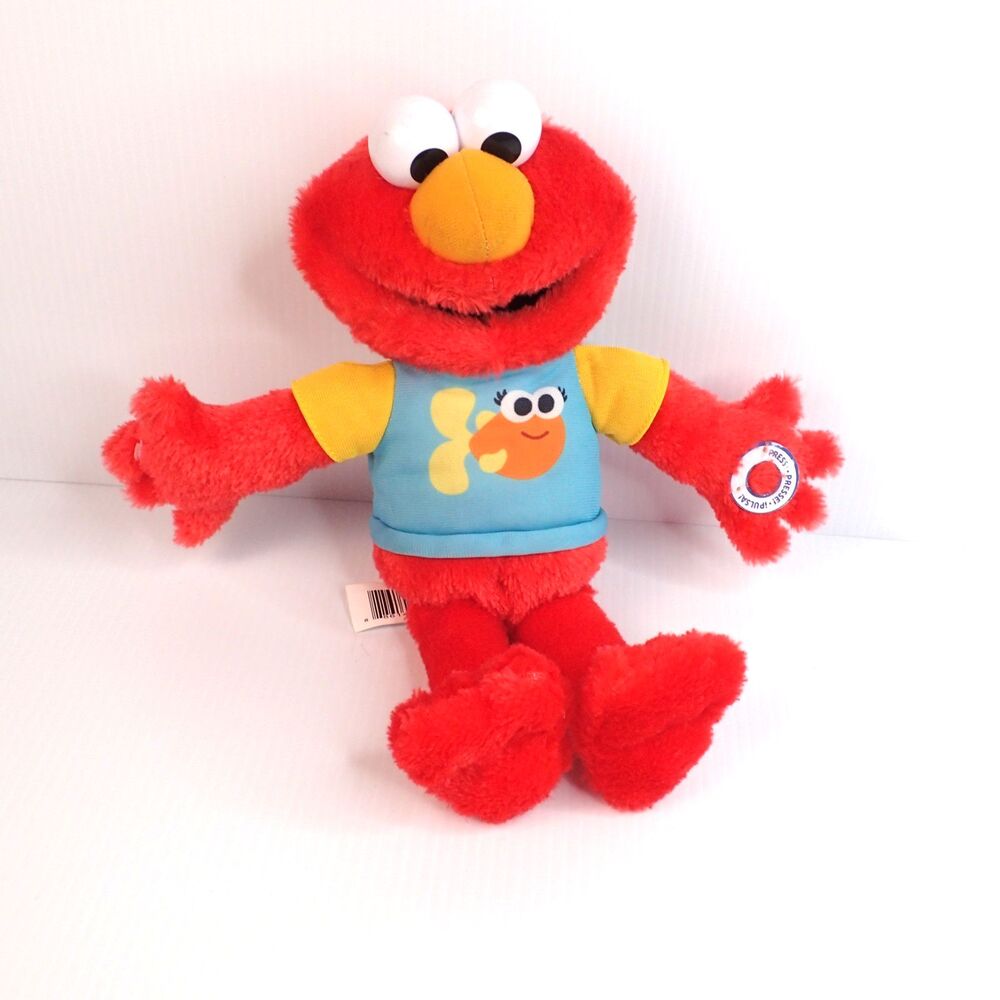 SESAME STREET 13-inch Sing-Along Plush Elmo with Lights and Sounds